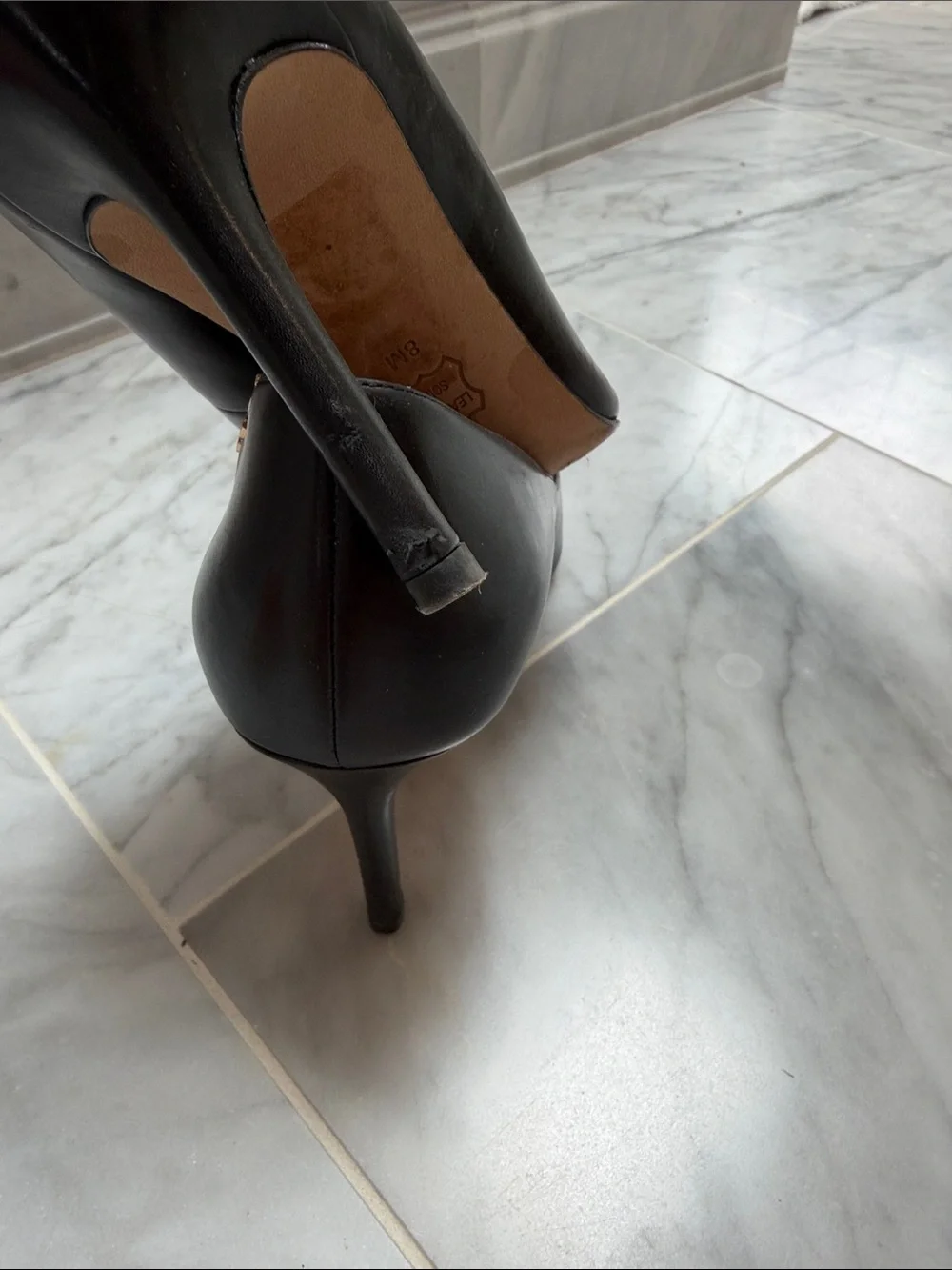 Tory Burch Black Pointed-Toe Leather Pumps with Gold Accent